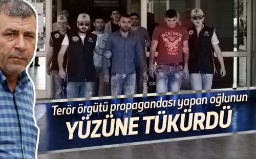 Tutuklu bir zanlının babası, elleri kelepçeli oğluna tükürerek tepki gösterdi